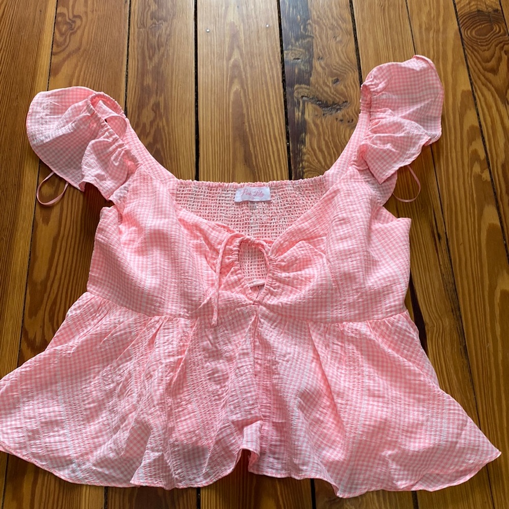 Pink lily peplum tank never worn!